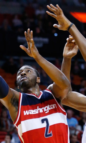 Watch John Wall completely embarrass Andrea Bargnani